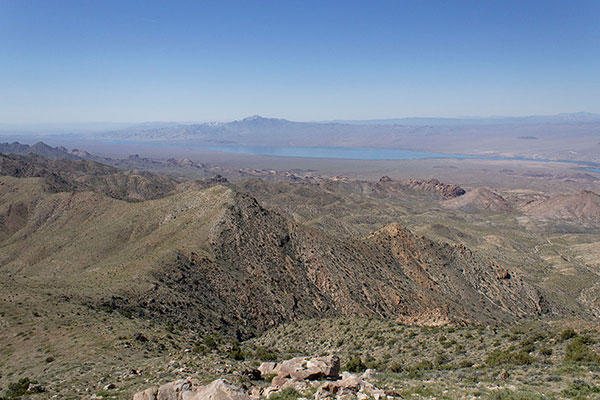 Lake Mohave and Spirit Mountain, Nevada, lie to the SSW from Mount Perkins
