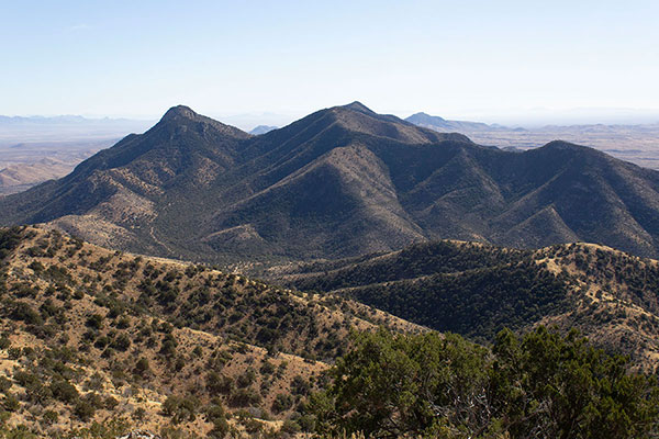 Black Diamond Peak on the left and Peak 7155 just in view in the center to the south